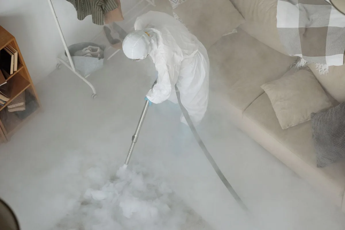 Biohazard cleanup technician in protective equipment, Jackson, SC